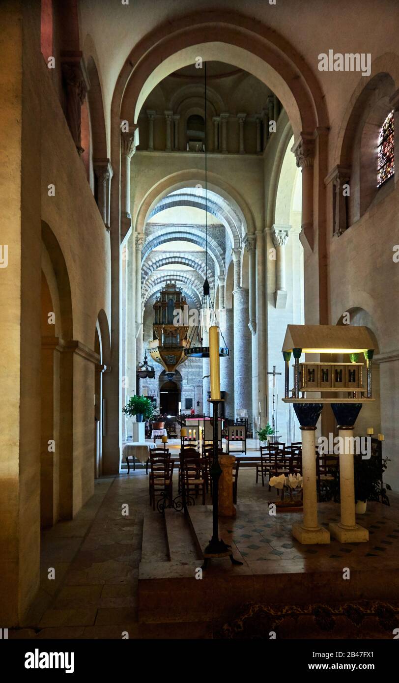 France , Tournus town, Bourgogne-Franche-Comté department, The nave of the abbey seen from the choir and the great organ and.Saint Philibert's cathedral, Abbey of Tournus is a former Benedictine monastery, its abbey church is one of the largest Romanesque monuments in France. Stock Photo