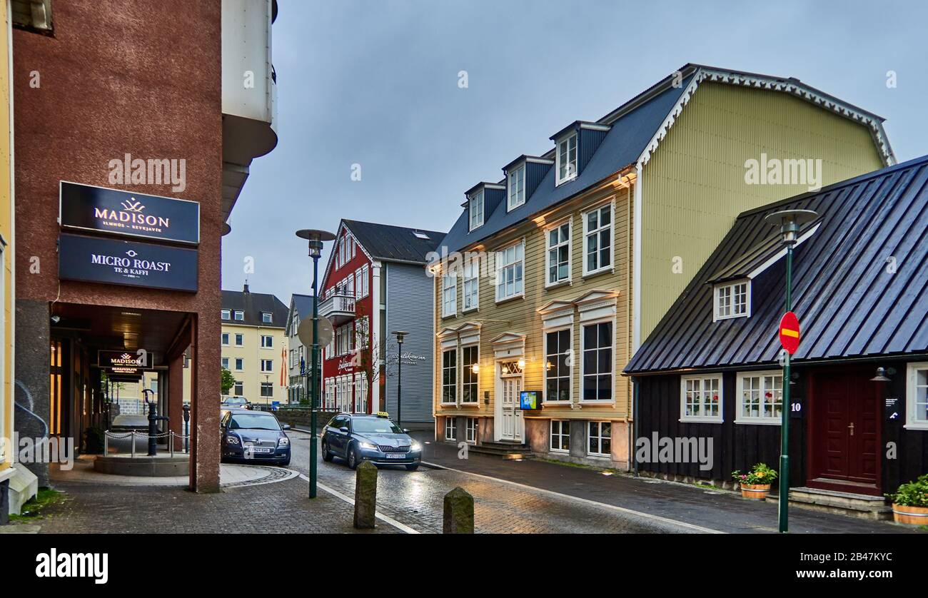 Europe , Colorful Buildings In City, shops and restaurants during a rainy day in the summer in Reykjavik, Iceland. Stock Photo