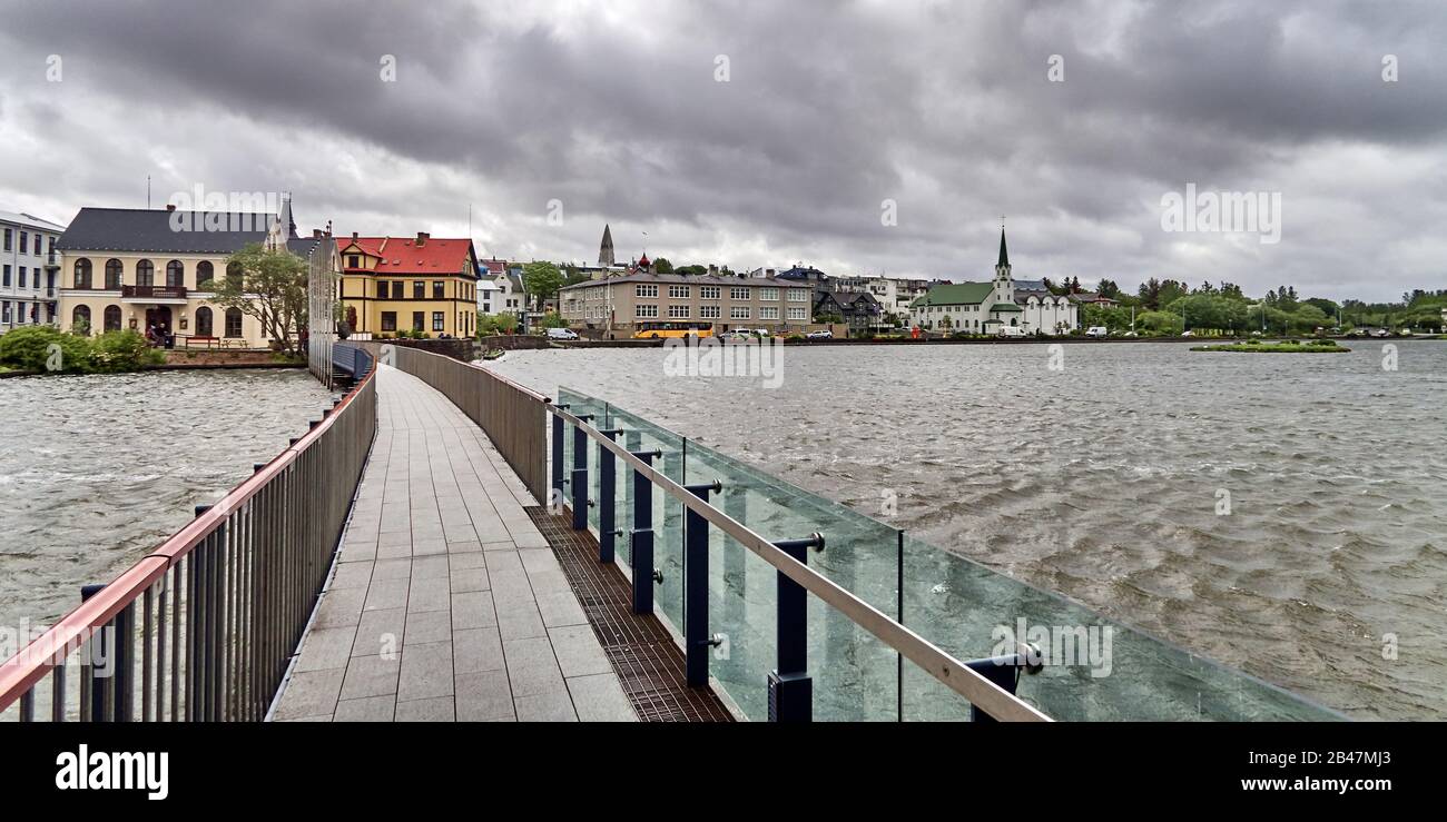 Europe ,Iceland , Reykjavik city, the gateway to the town hall on the Tjörnin lake Stock Photo