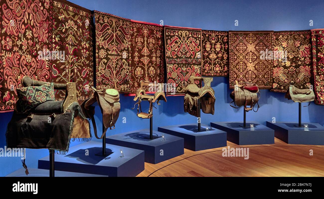 Reykjavik, The National Museum of Iceland, side-saddle with beautiful metal ornaments, covered with images often depicting exotic motifs of plants, animals and fantastic creatures. Also with "hellüodull" a chair like saddle with a back-rest Stock Photo