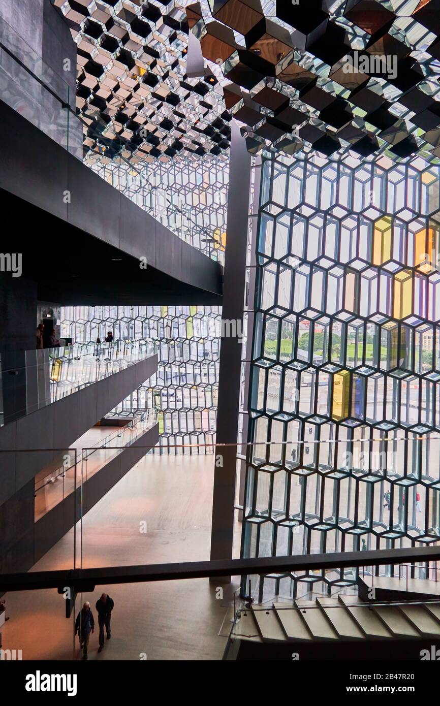 Europe ,Iceland, Reykjavik, the Harpa Concert Hall, Architect: Henning Larsen Architects and Ólafur. The structure consists of a steel framework clad with geometric shaped glass panels of different colours. Stock Photo