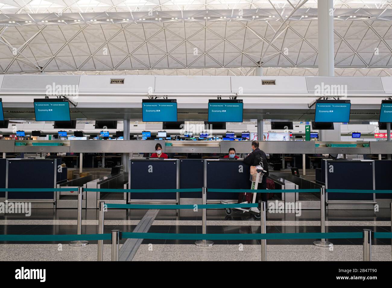 Hong Kong, China. 6th Mar, 2020. A traveller checks in at the Cathay