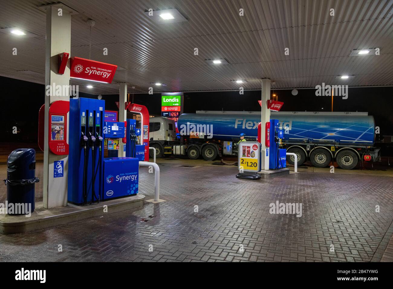 Esso garage filling station forecourt having fuel delivery 2020 Stock Photo
