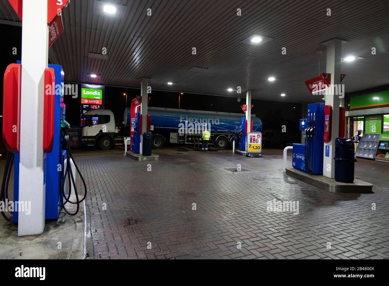 Esso garage filling station forecourt having fuel delivery 2020 Stock Photo