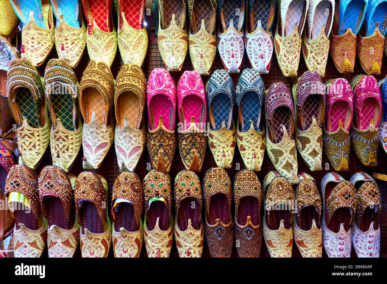 Colorful arabian babouches shoes at market stall Stock Photo