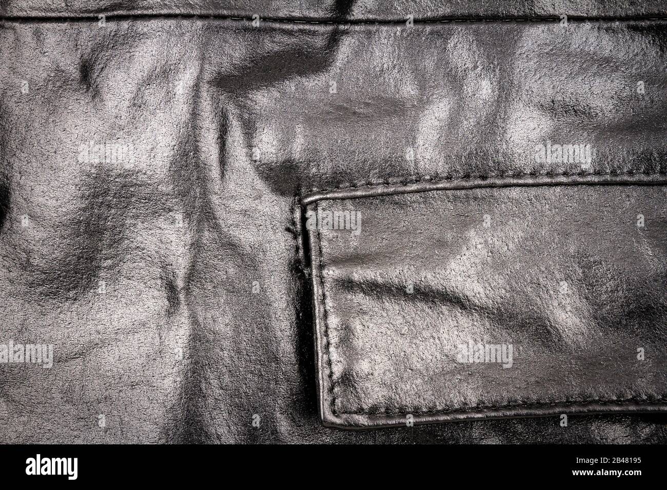 Abstract dark leather jacket texture hi-res stock photography and ...