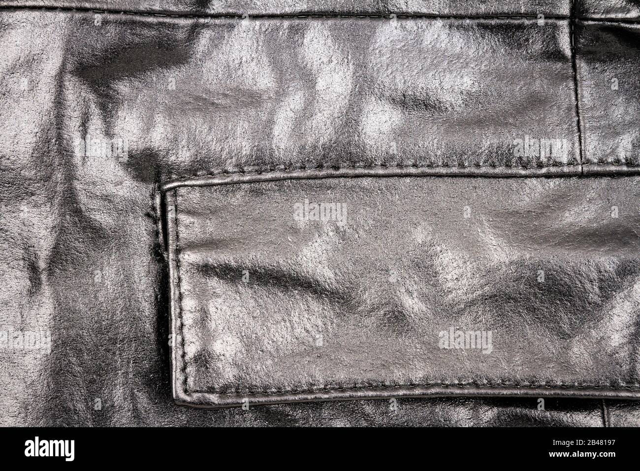Abstract dark leather jacket texture hi-res stock photography and ...