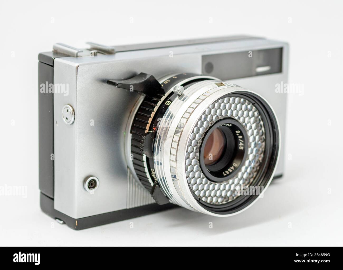 Vintage film camera isolated on white background Stock Photo - Alamy