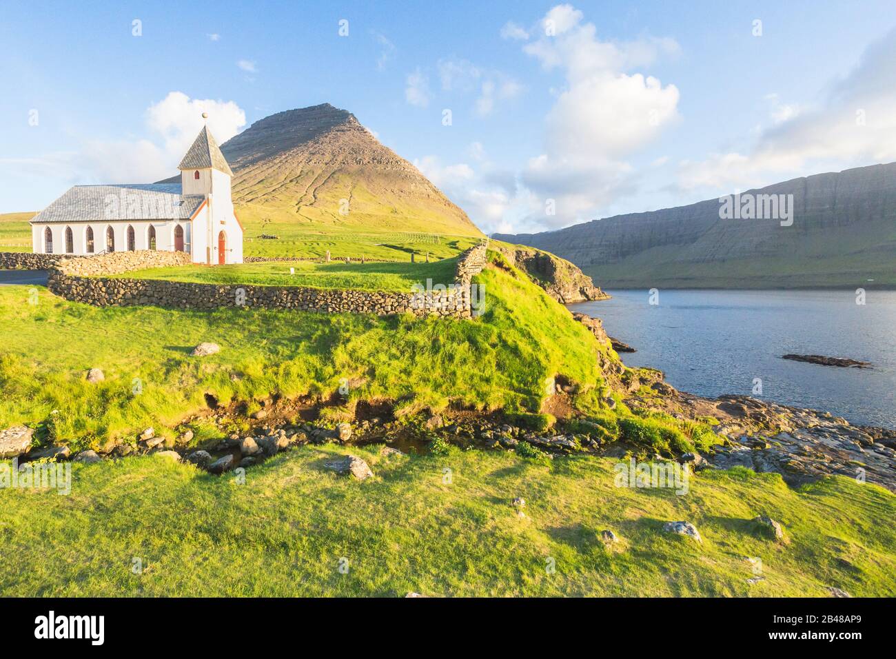 Church by the sea, Vidareidi, Viðareiði, Faroe Islands, Denmark, Northern Europe, Europe Stock Photo