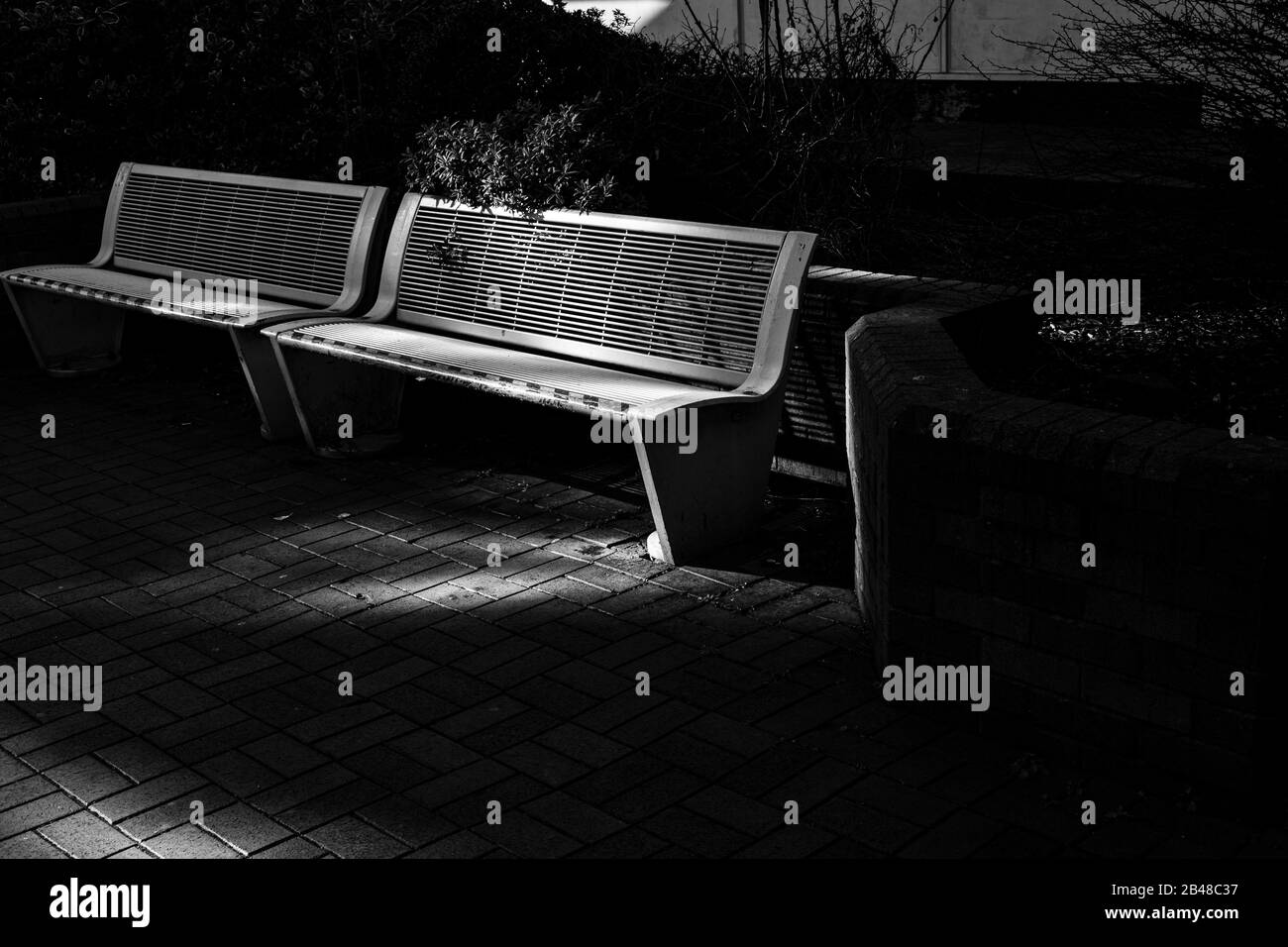 Two benches in the winter sun. Stock Photo