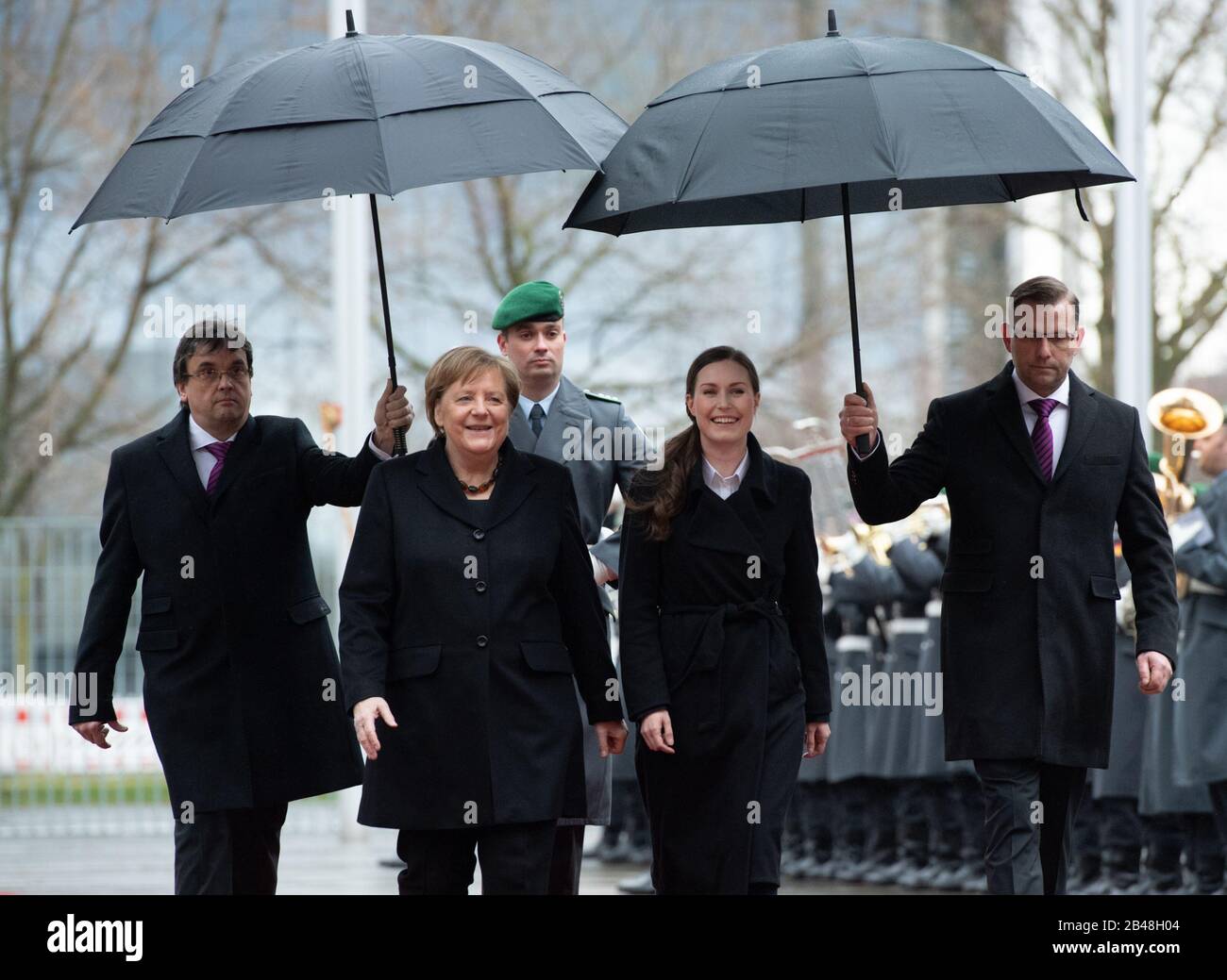 Chancellor Angela MERKEL and Minister President Sanna MARIN Reception and greeting of the Minister President of the Republic of Finland with military honors at the Federal Chancellery, Berlin, Germany on February 19, 2020. | usage worldwide Stock Photo