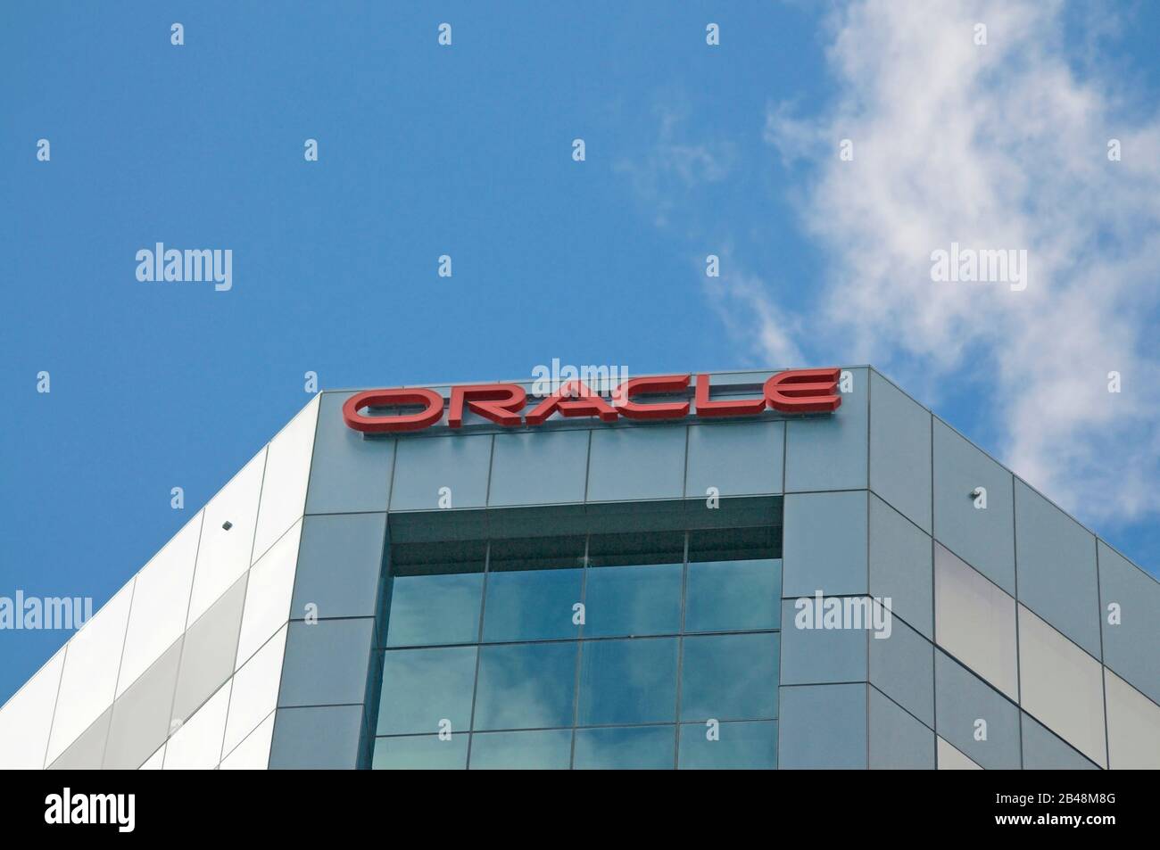 Brisbane, QLD, Australia - 26th January 2020 : Oracle corporation sign hanging on the top of the building in Brisbane. Oracle Corporation is an Americ Stock Photo