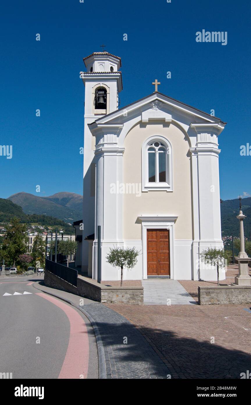 View of the beautiful small Church of the village Porza located in the canton Ticino in Switzerland Stock Photo