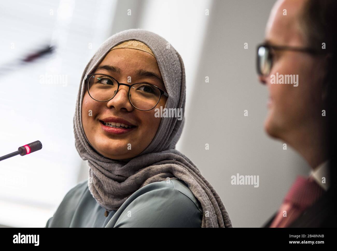 Munich, Bavaria, Germany. 6th Mar, 2020. SHAHNURA KASIM, a Munich-based Uyghur who displayed photos of family members who have gone missing in the Xinjiang Province of China. Held in the Bavarian Landtag, Markus Rinderspacher of the SPD and Asgar Can of the Uigurischen Gemeinde Europa e.V., discussed the situation in the Xinjiang Province of China. Potentially 11 million Uyghurs live under oppression in China with 150 of the largest concerns in Europe have economic interests in the region and Uyghurs in their supply chain, such as Nike, Volkswagen, Apple, BMW, Samsung, Huawei, Sony, and othe Stock Photo