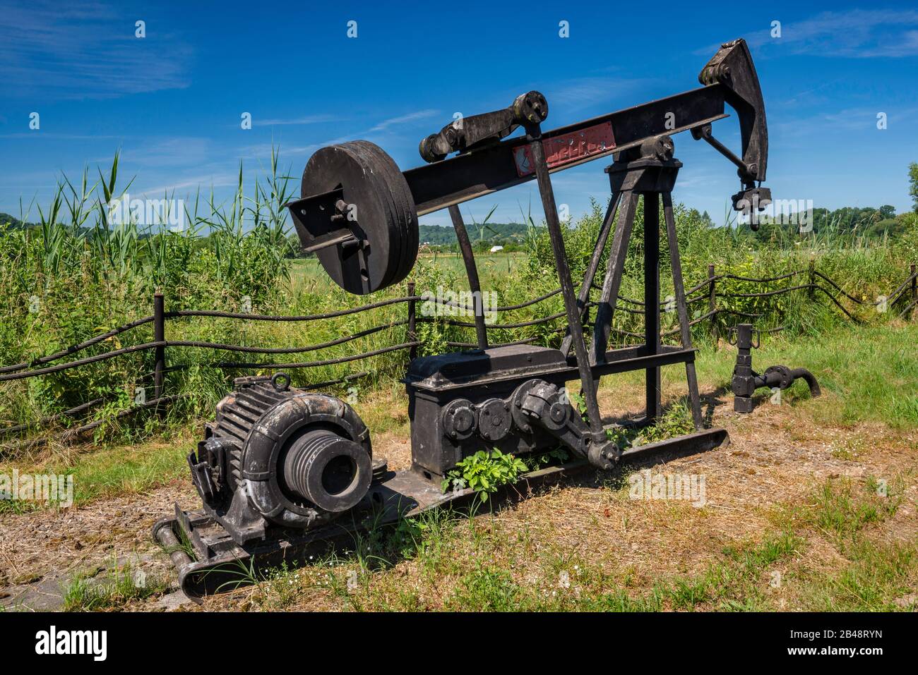 WULFEL-500 oil well pump jack, 1962, used in Subcarpathian wells, oil industry exhibition at Rural Architecture Museum in Sanok, Malopolska, Poland Stock Photo