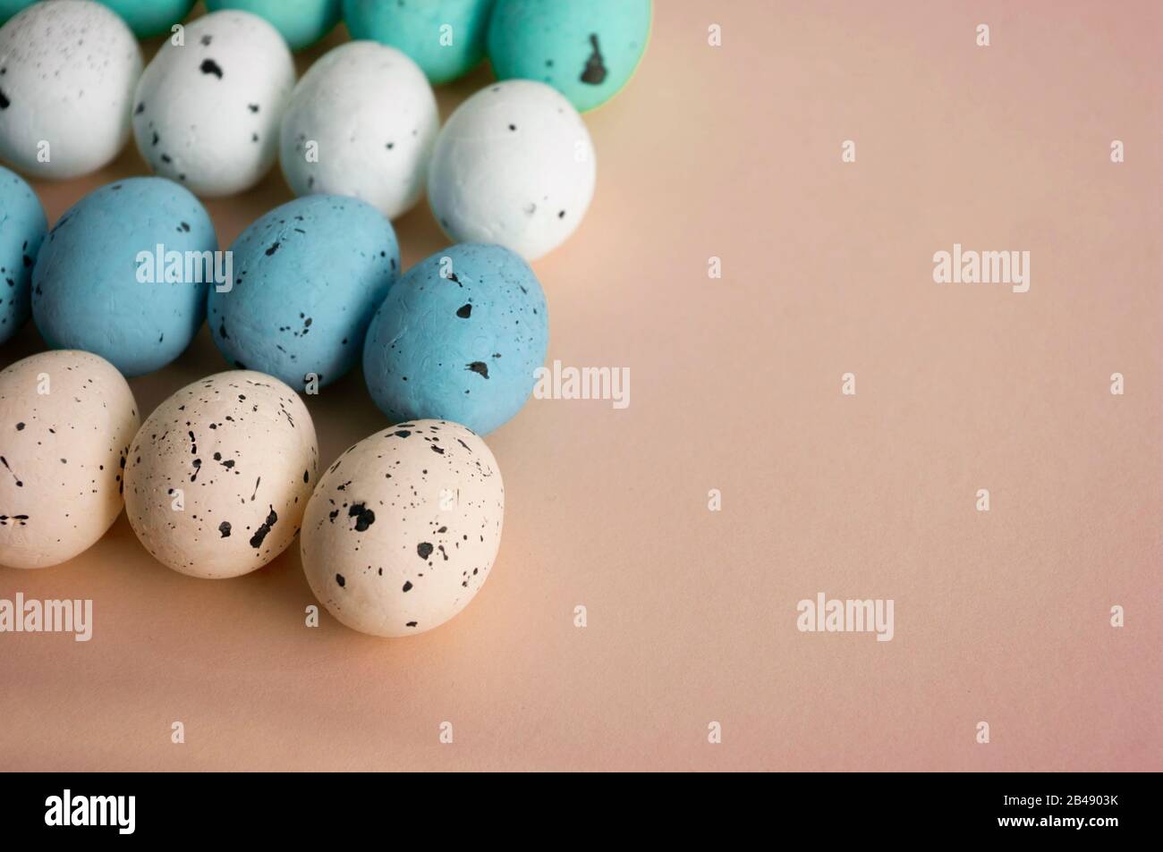 eggs,Pastel color, easter colorful decor on beige backgground. Stock Photo