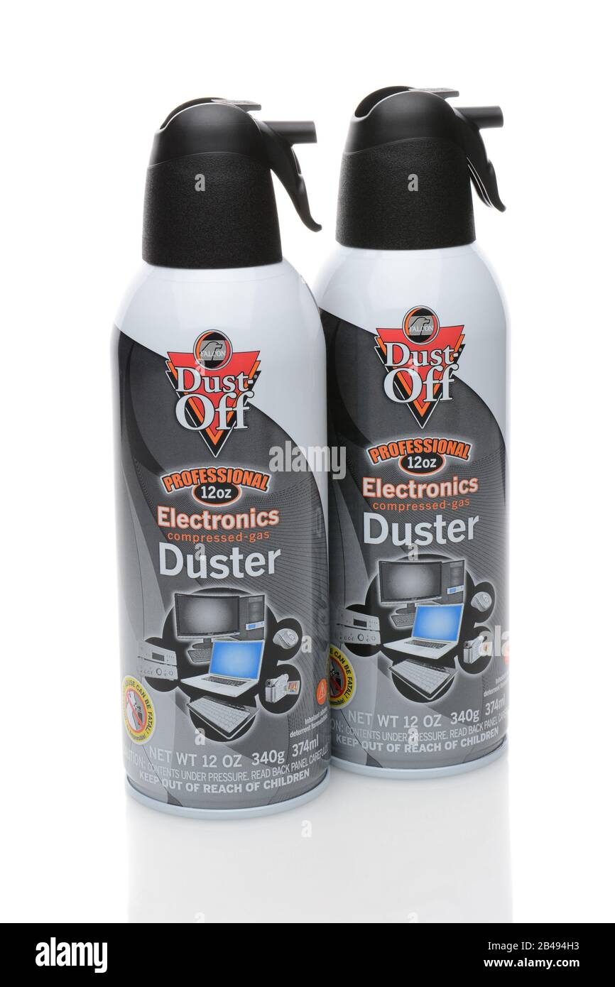 IRVINE, CA - DECEMBER 29, 2014: Two cans of Dust-Off cleaner. From Falcon it contains difluoroethane and is used to remove particulates and dust from Stock Photo