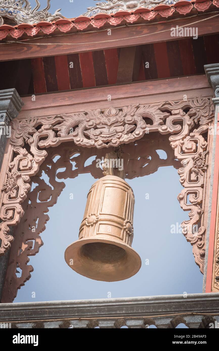 Typical bell tower outdoor instrument under clear blue sky in Vietnam