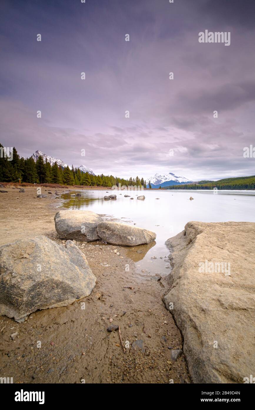 Beautiful view of frozen Maligne Lake in Jasper National Park Stock