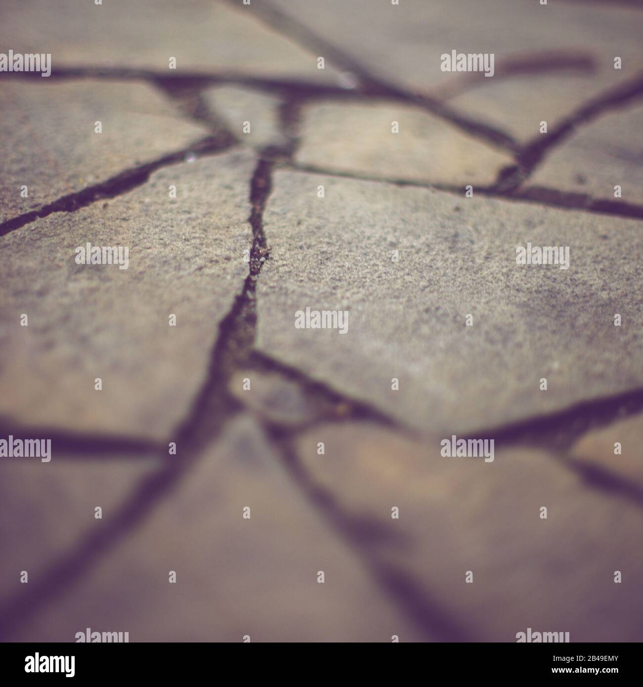 Brown wild stone pavement floor. Irregular shapes pattern. Stock Photo