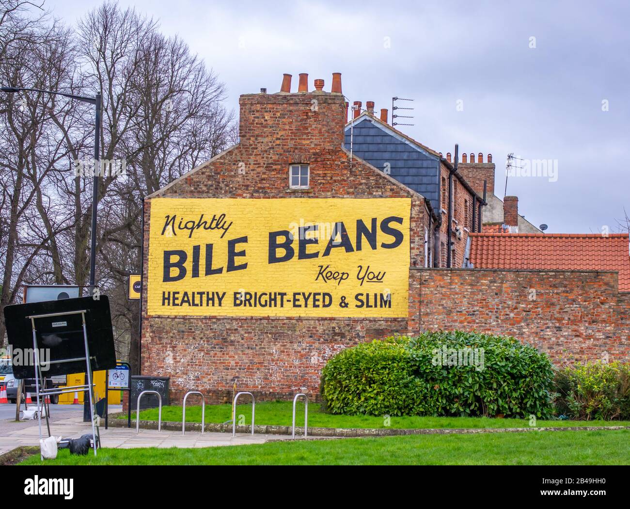 Old and historical advertising on the side of a house in York. Stock Photo