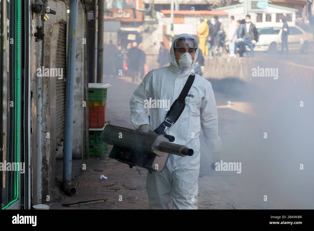 Tehran, Iran. 6th Mar, 2020. Firefighter teams with protective suits disinfect the Tajrish Bazaar as a precaution to the coronavirus (Covid-19) in Tehran, Iran. Iranian officials canceled Friday prayer for the second week due to concerns over the spread of coronavirus and COVID-19. According to the last report by the Ministry of Health, there are 4,747 COVID-19 cases in Iran. 147 people have died so far. A Health Ministry spokesman warned authorities could use unspecified 'force' to halt travel between major cities. Credit: Rouzbeh Fouladi/ZUMA Wire/Alamy Live News Stock Photo