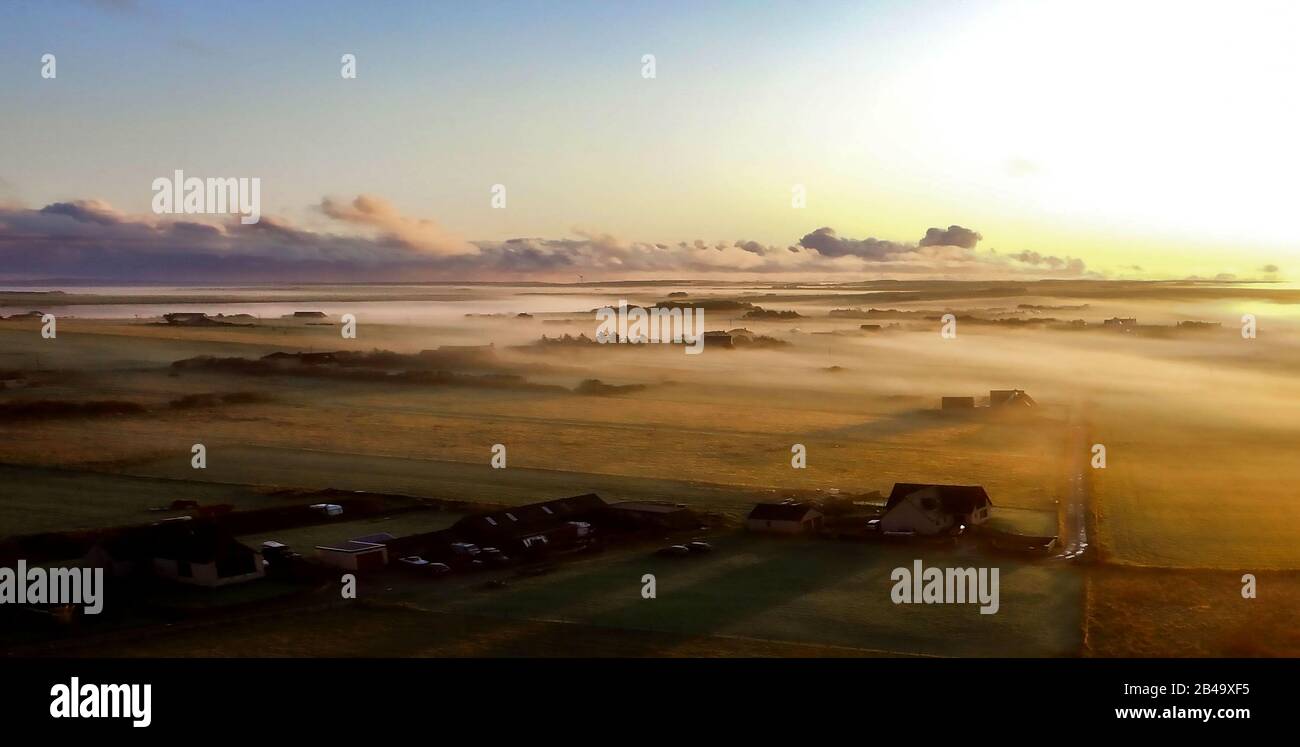 Misty Sunrise over Dunnet Village, Caithness Stock Photo