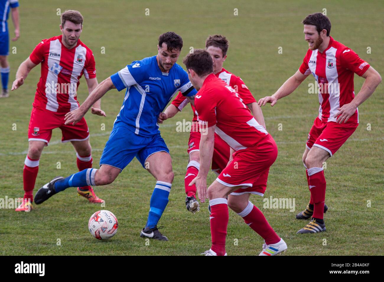 Luke Bowen of Port Talbot Town in action against Undy Athletic. Stock Photo