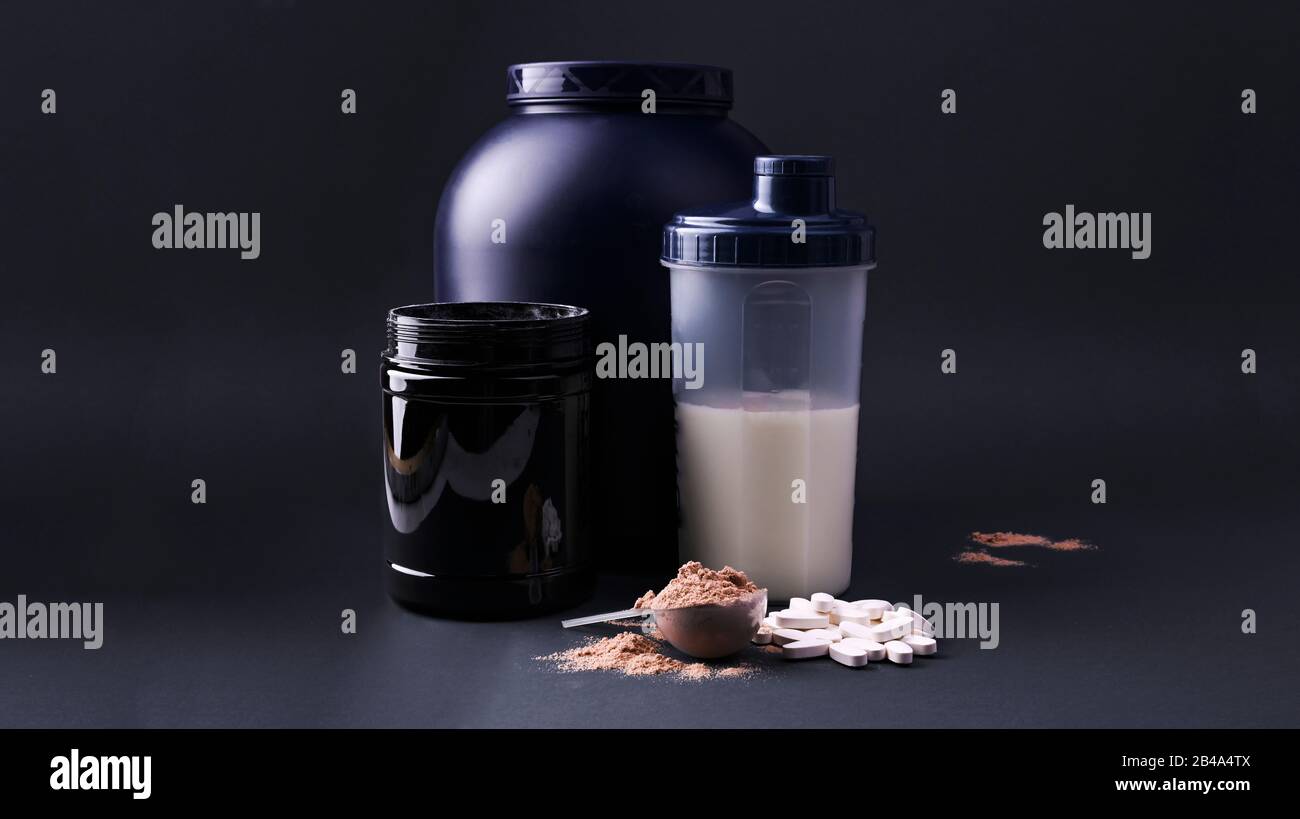 Sports nutrition supplements on a black background. Fitness