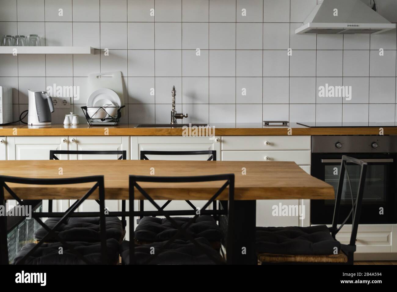 Modern, bright, clean, kitchen interior with stainless steel appliances ...