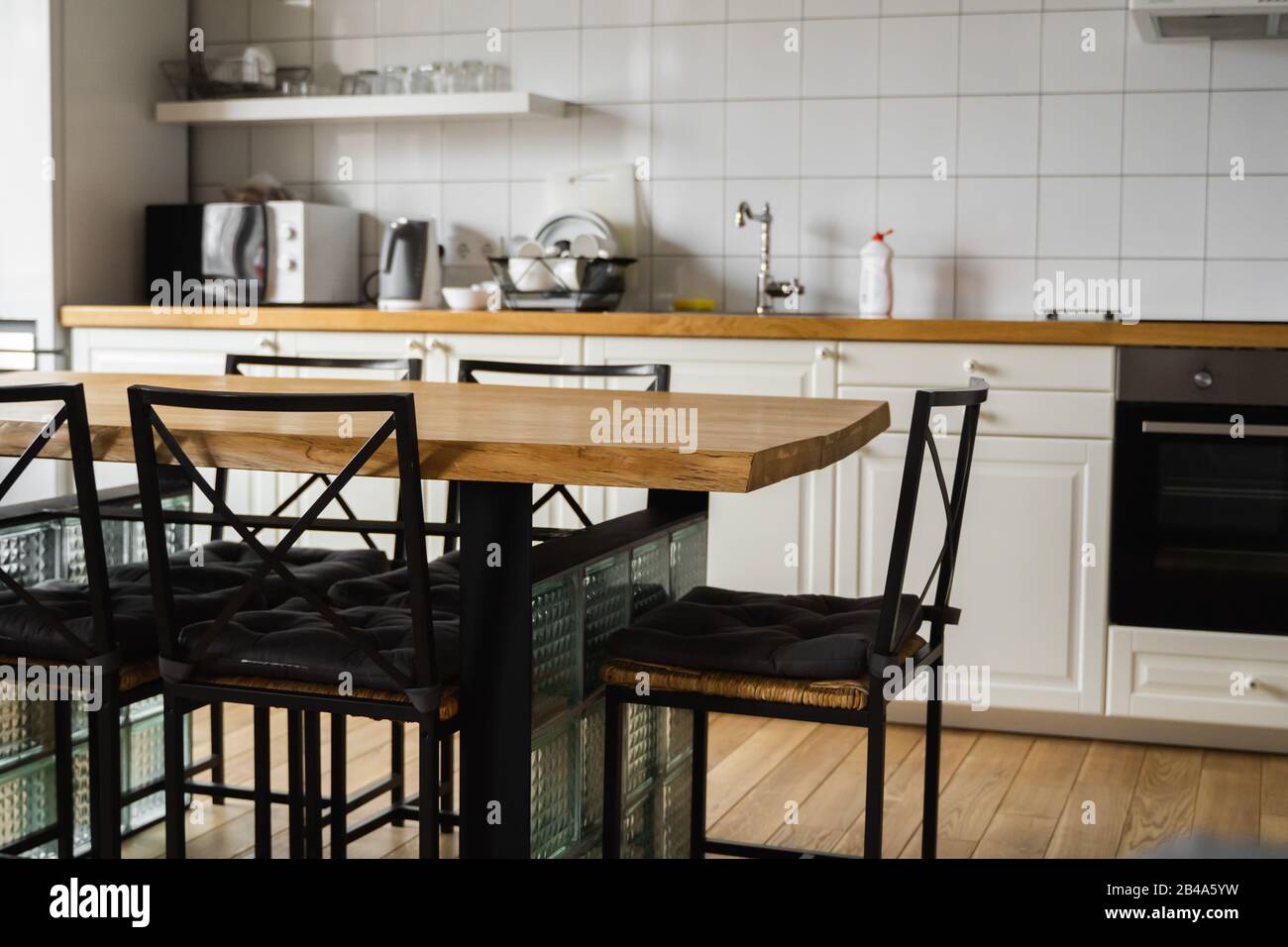 Modern, bright, clean, kitchen interior with stainless steel appliances ...