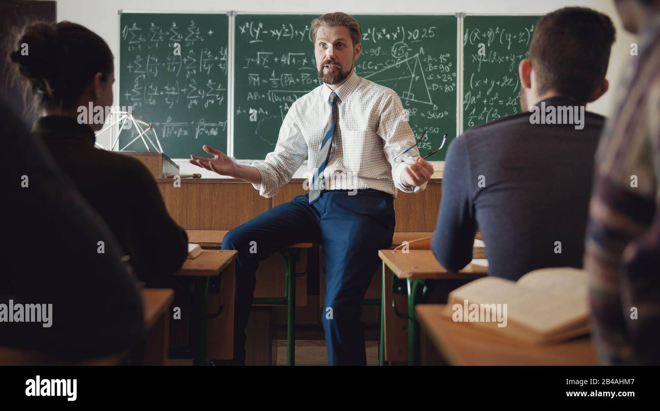 Students listening to teacher Stock Photo