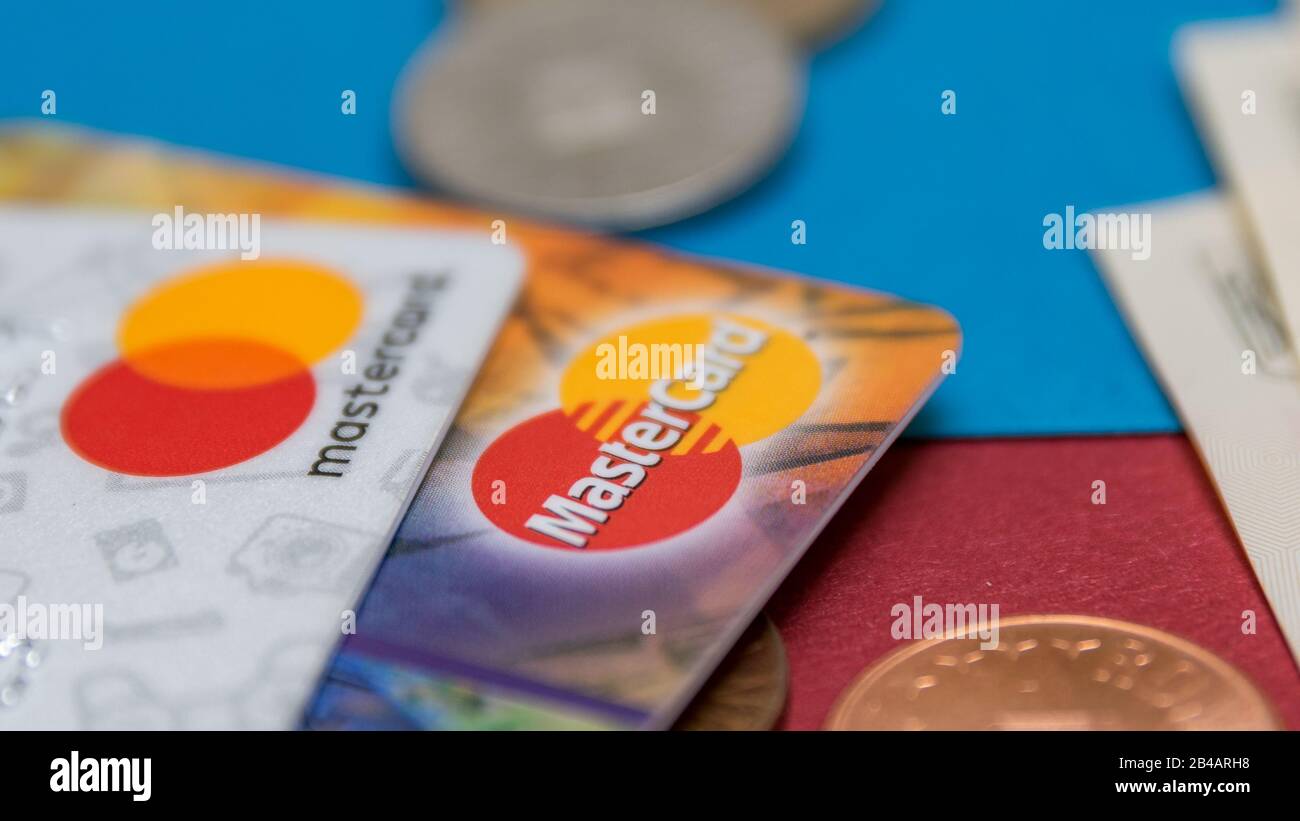 CLUJ, ROMANIA - NOV 08, 2019: MasterCard old and new logo macro, closeup on the plastic bank cards. Illustrative editorial, shallow depth of field of Stock Photo