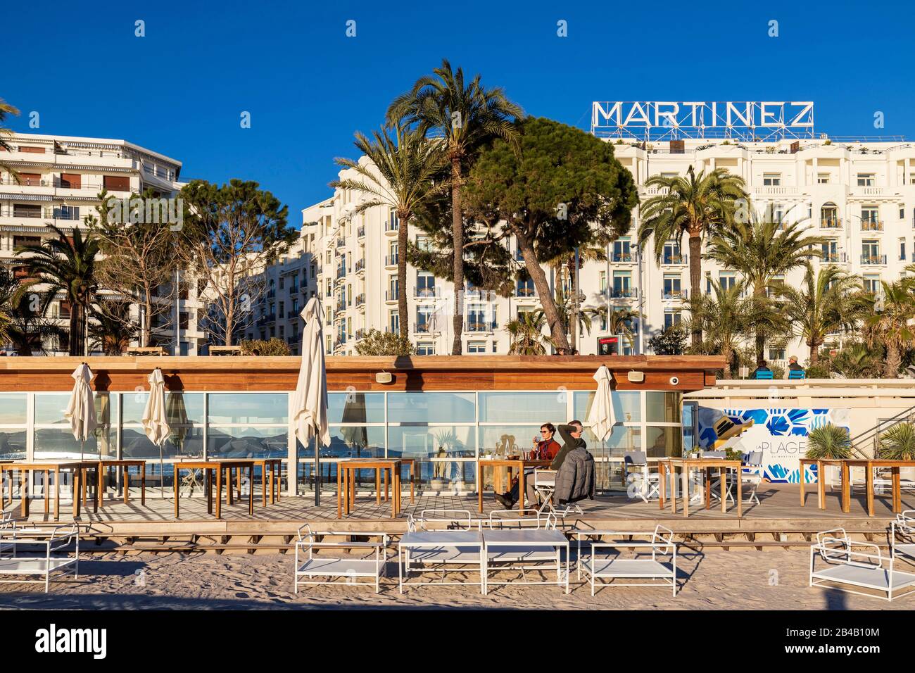 France, Alpes-Maritimes, Cannes, the private beach of the Martinez palace and the hotel in the background Stock Photo