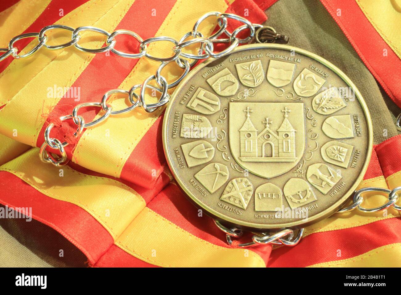 France, Haut Rhin, Munster, brotherhood Saint Gregoire du Taste Cheese from the valley of Munster, their medal with the badge of the city of Munster and the 15 municipalities of the canton Stock Photo