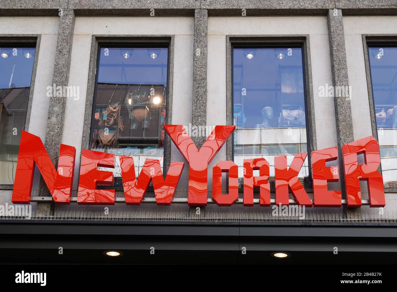 Hannover, Germany - March 2, 2020: New Yorker brand and company name sign of german fashion clothing retail chain store Stock Photo