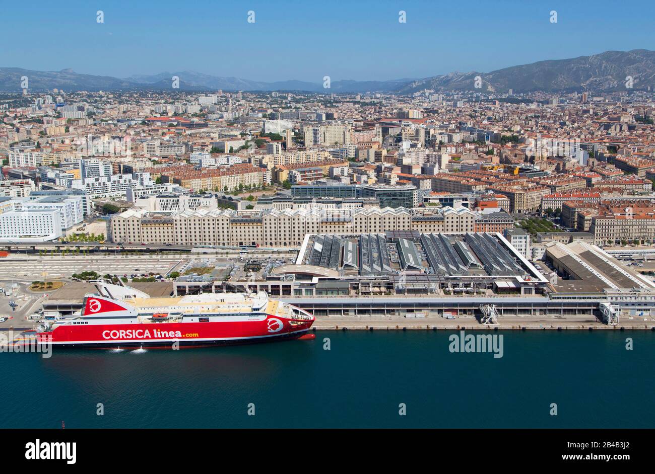 France, Bouches du Rhone, Marseille, 2 nd arrondissement, Grand Port  Maritime de Marseille or GPMM, euromediterranee district, shopping center,  the port terraces and Corsica Linea ferry (aerial view Stock Photo - Alamy