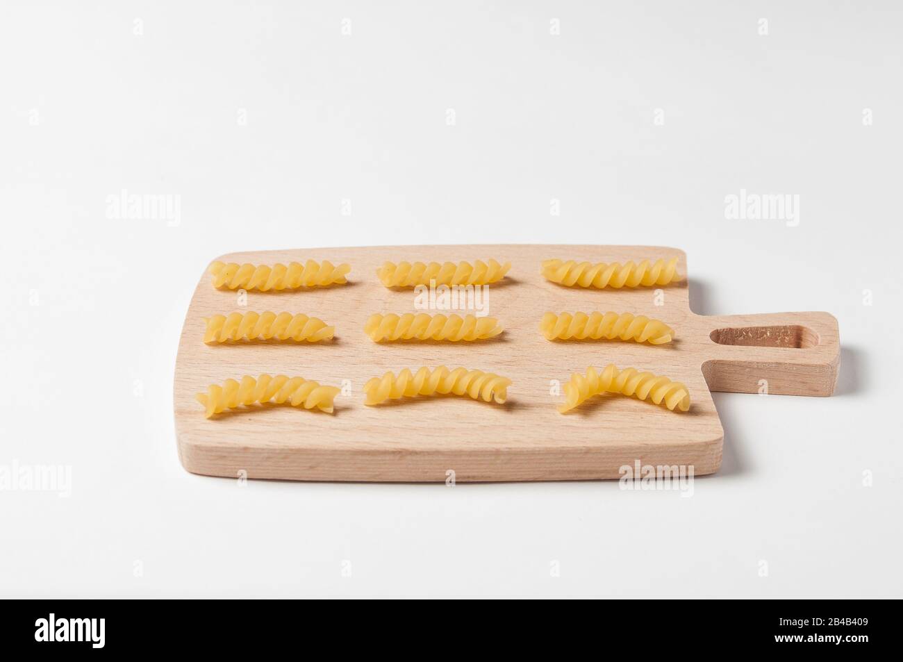 Italian food. One of the tipe of Italian pasta on a wooden board Stock Photo