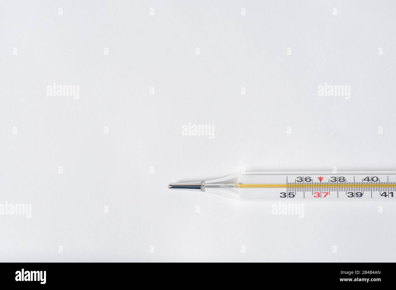 A thermometer to measure body temperature on a white background Stock