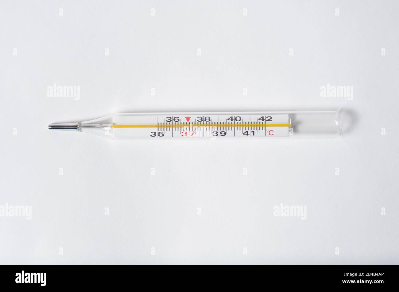 A thermometer to measure body temperature on a white background Stock