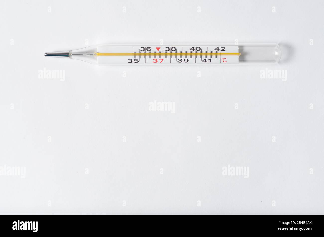 A thermometer to measure body temperature on a white background Stock