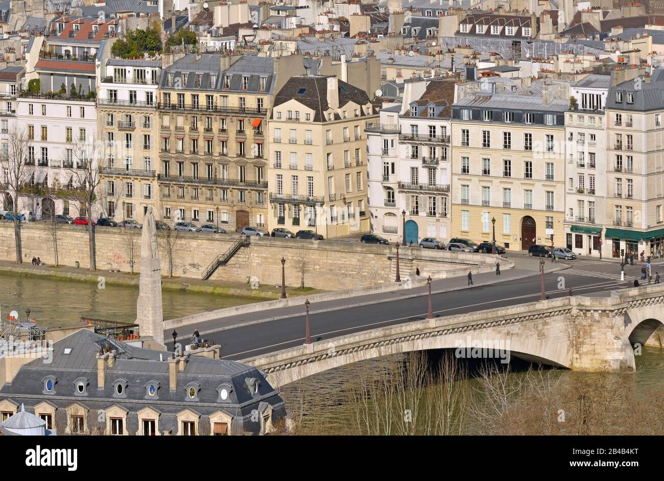 France, Paris, area listed as World Heritage by UNESCO, the river Seine and a boat with pont de Tournelle between the Ile Saint Louis and the left bank Stock Photo
