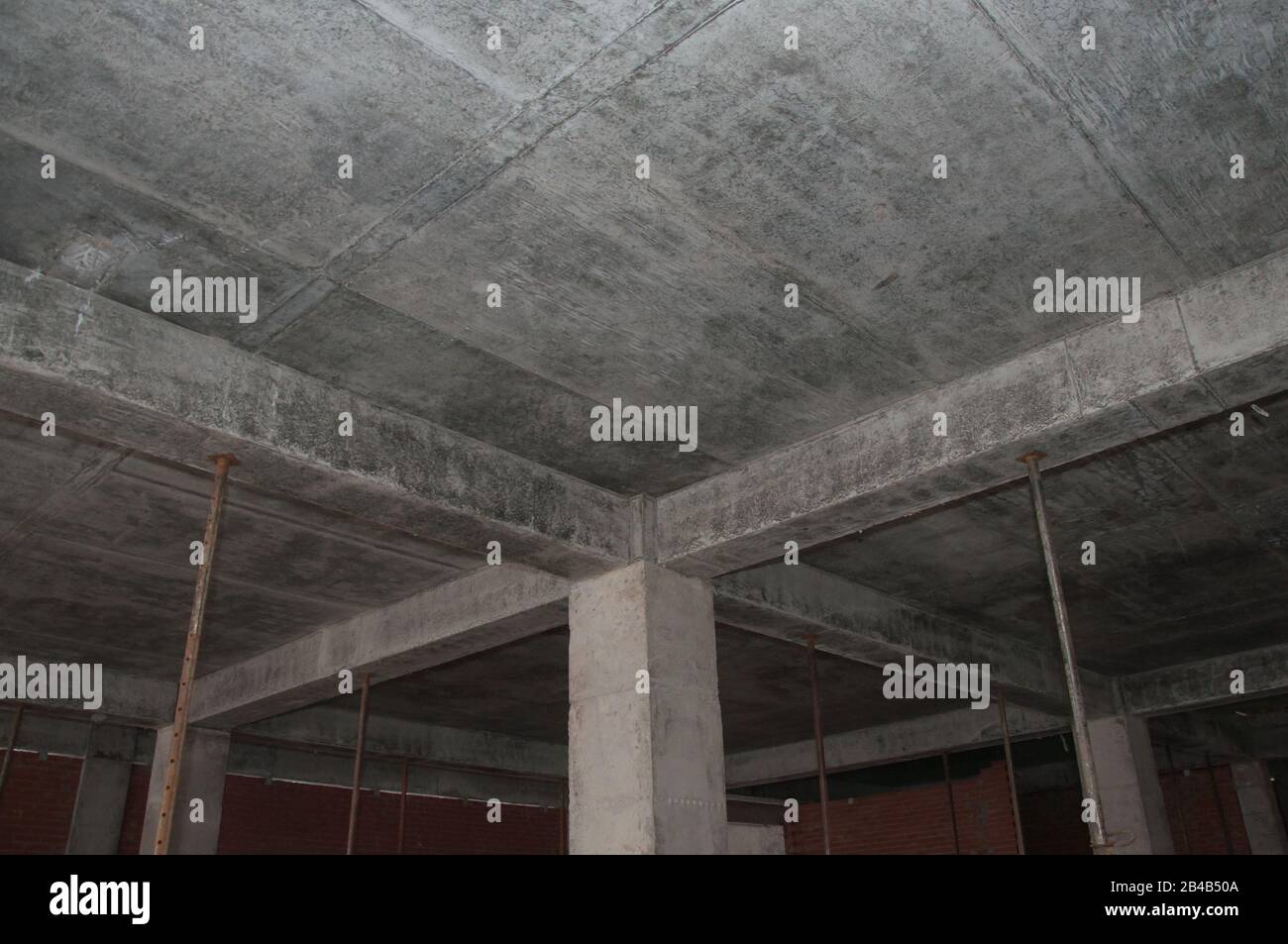 Concrete frame of the building under construction. Concrete ...