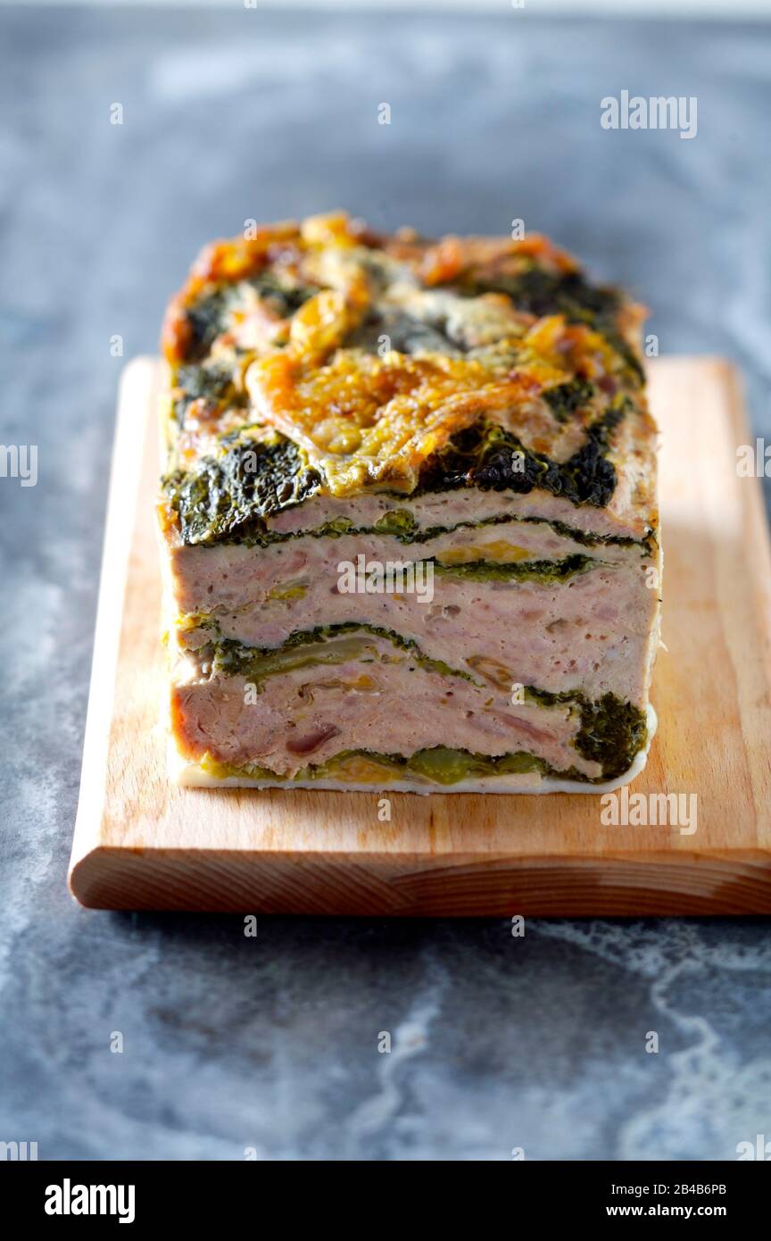 Guinea fowl terrine with green cabbage Stock Photo - Alamy