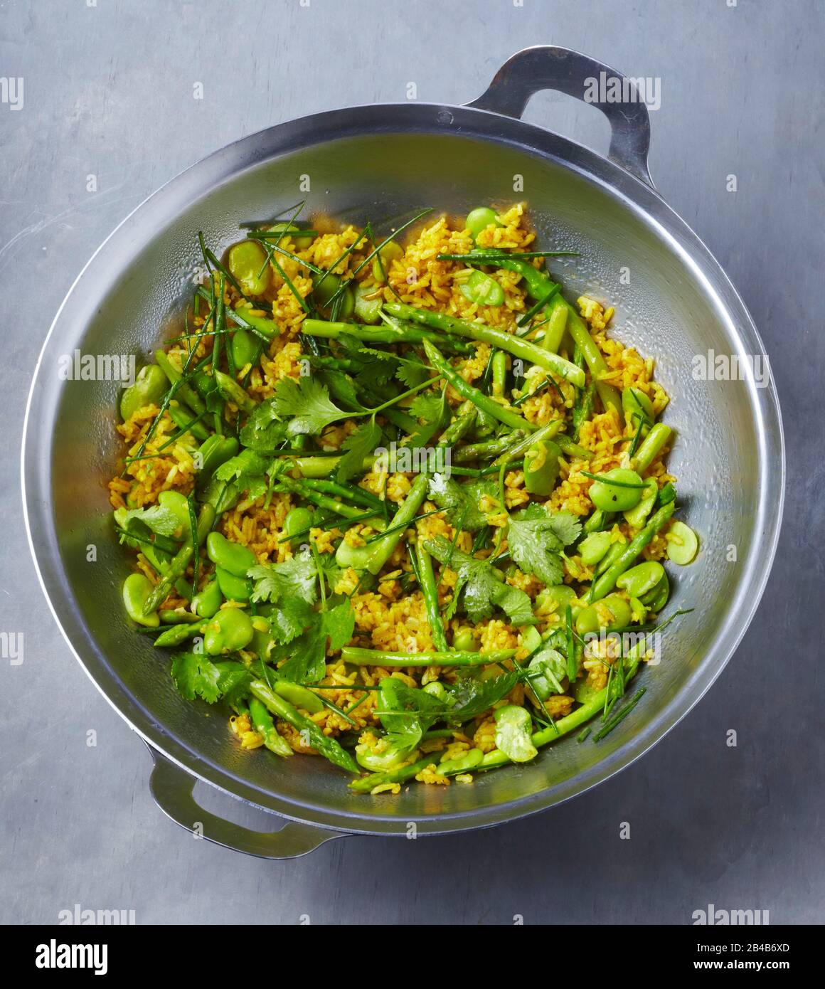 Yellow Rice Round Shape Round wok, spiced yellow rice Stock Photo - Alamy