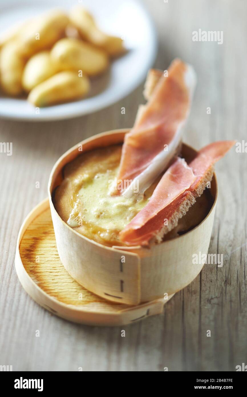 Melted cheese, ovenbaked vacherin Stock Photo Alamy