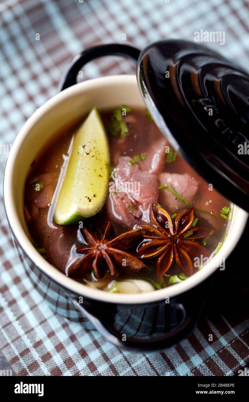 Beef broth minced beef with star anise Stock Photo Alamy