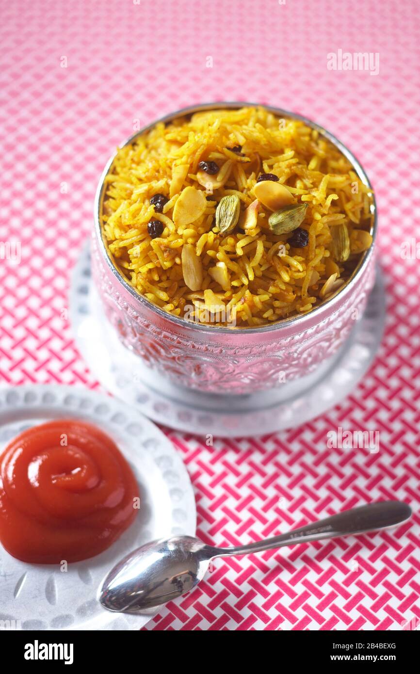 Ketchup dish, Indian rice Stock Photo Alamy