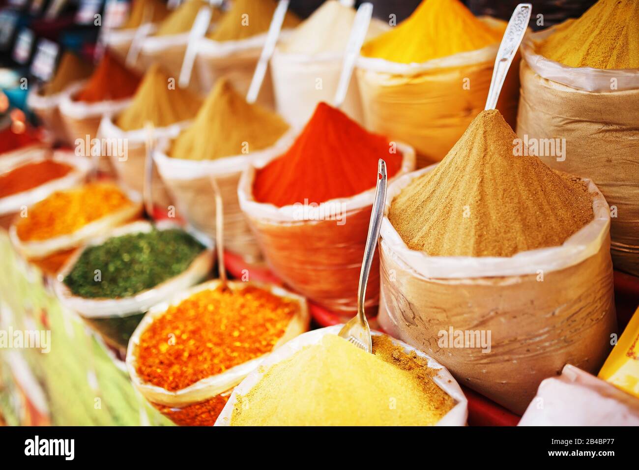 Indian colored spices at local market. A variety of spices of different
