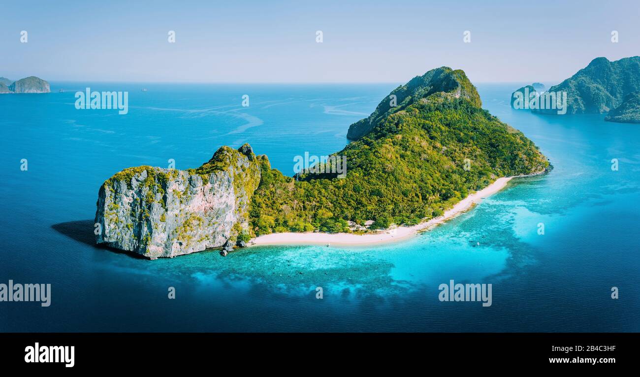 Early Morning drone Aerial panorama view of Helicopter Island in the Bacuit Bay in El Nido, Palawan, Philippines. Stock Photo